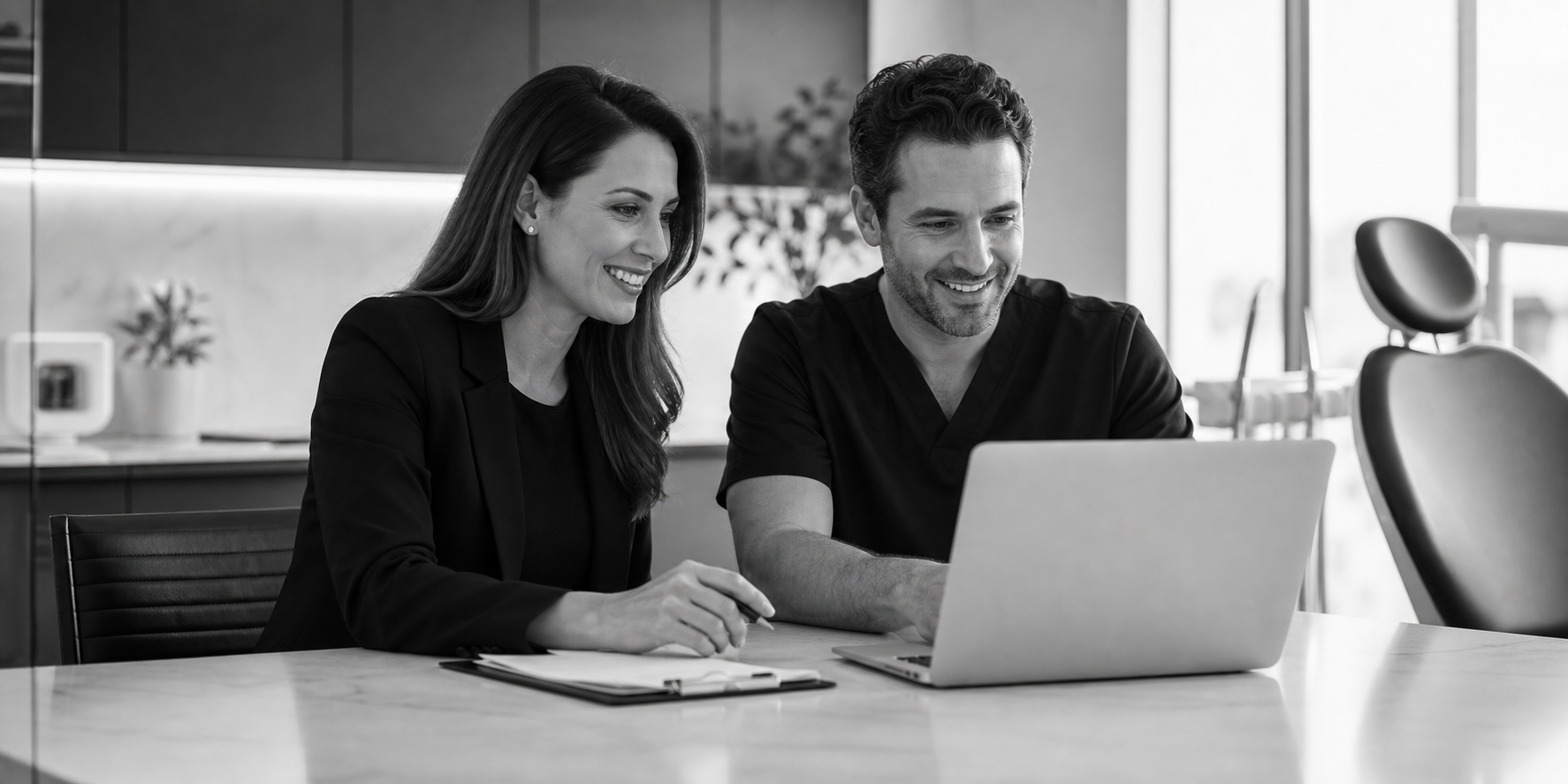 Dental front desk coordinator managing the practice schedule